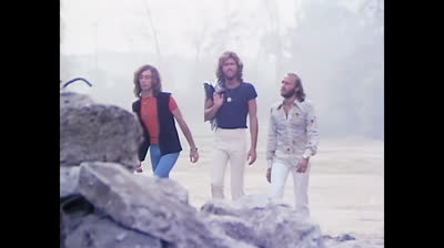 Bee Gees - Stayin' Alive (Official Music Video) .